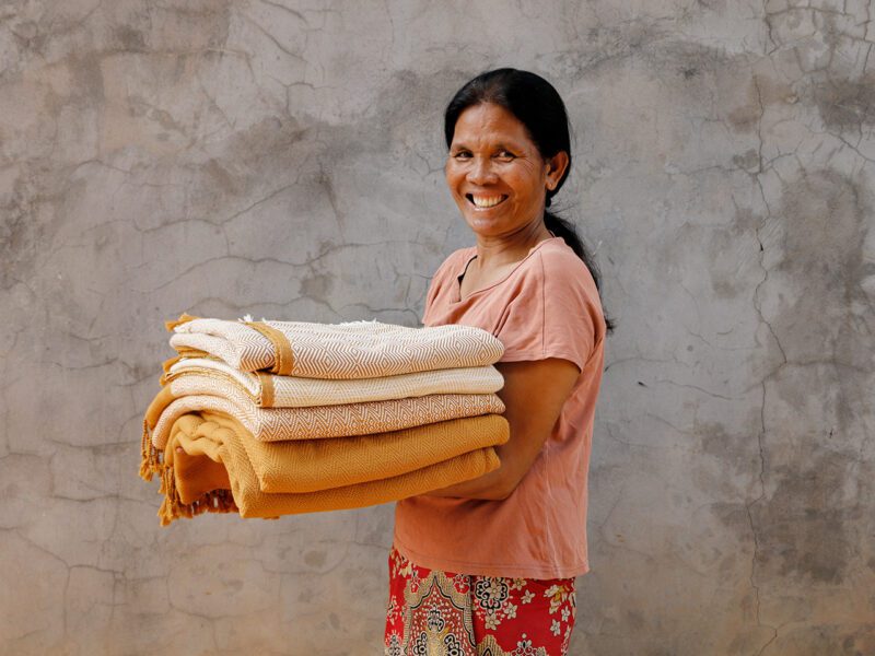 Fair Weave Cambodian artisan with towels