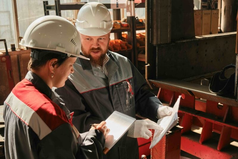Workers reviewing documents